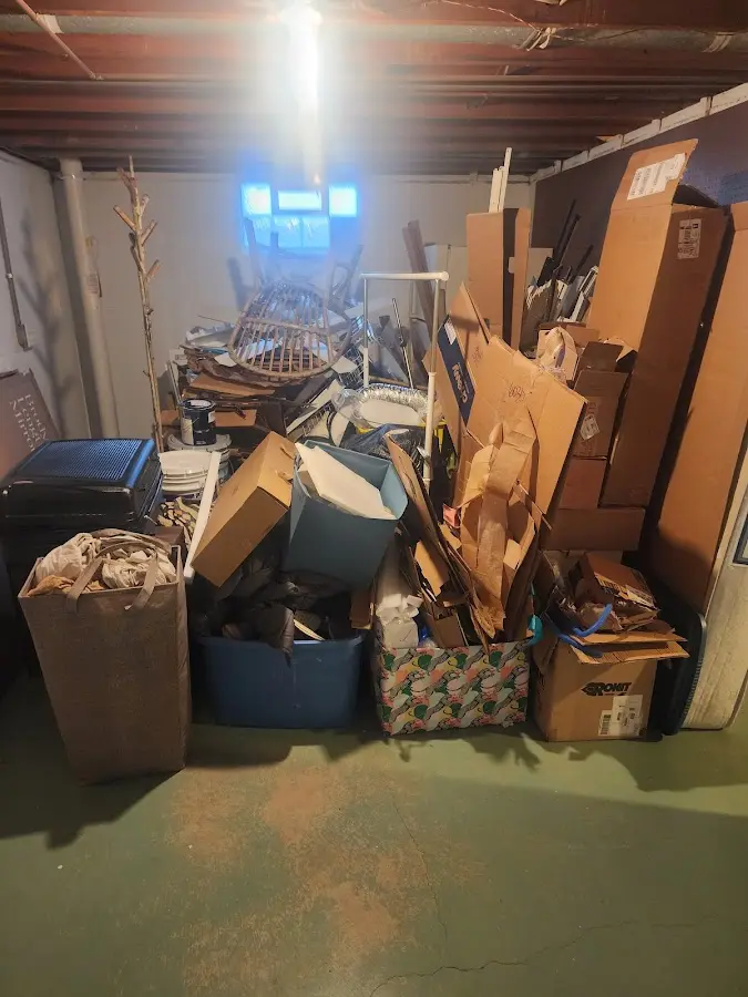 Roll-off dumpster container at job site for 4 Yard Dumpster Rental in Orange Beach